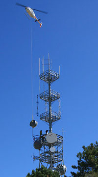 Some HPWREN installations are very remote or otherwise difficult to access. In this 2007 installation, a helicopter had to be used to provide access to a backbone site.