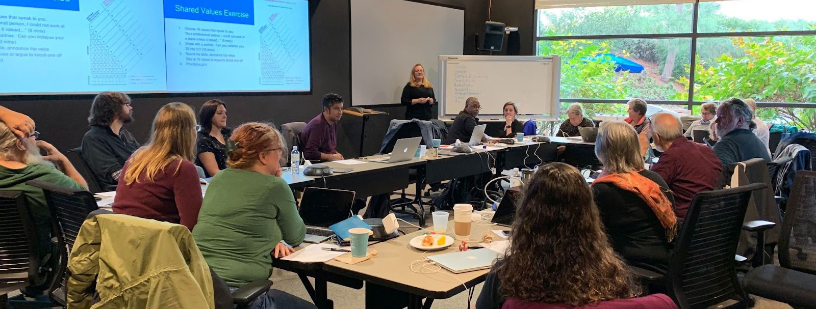 Image of Christine Kirkpatrick leading the EarthCube Leadership Council and EarthCube Office in a Shared Values Exercise in 2019. 