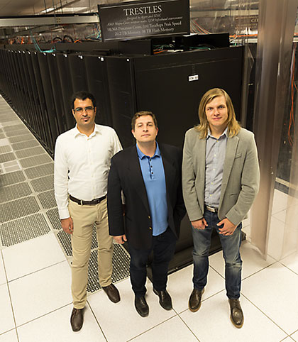 Yuri Bazilevs, center, is associate director of CEER and an expert in finite element analysis and isogeometric analysis. He is pictured with postdoctoral researcher Kazem Kamran, left, and Ph.D. student Artem Korobenko, right.